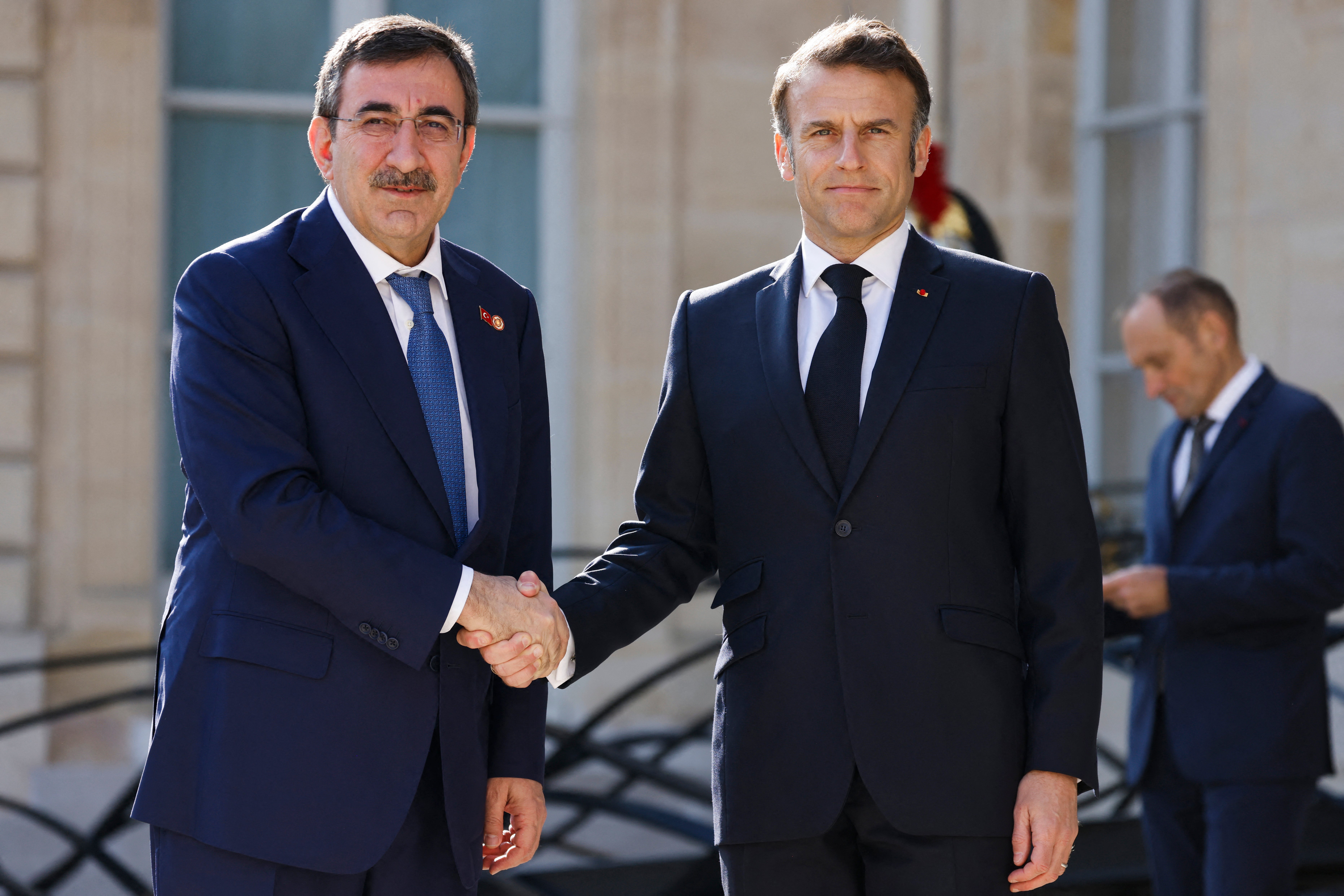 France's President Emmanuel Macron welcomes Turkey's new Vice-President Cevdet Yilmaz