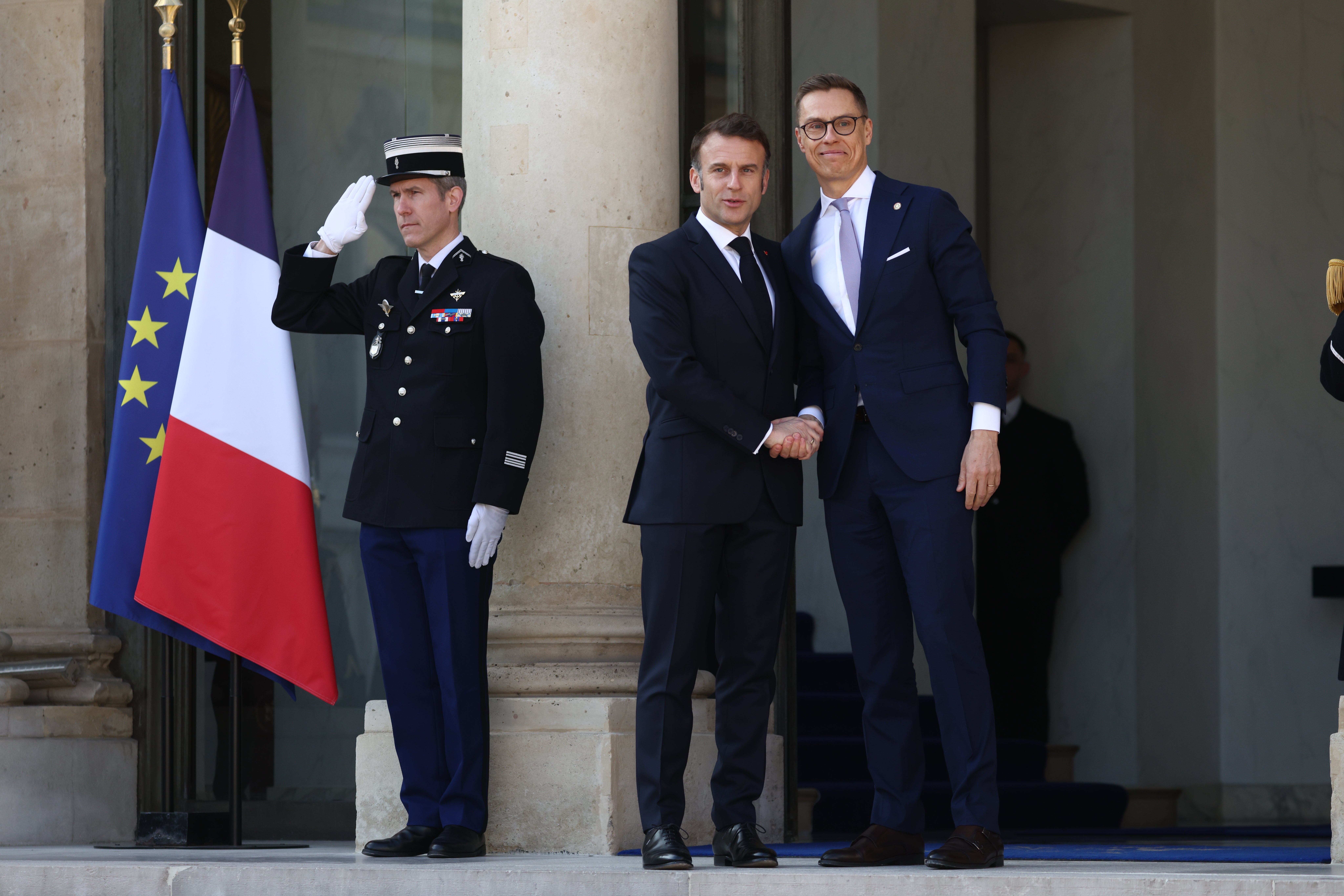 President of Finland, Alexander Stubb, is greeted by French President Emmanuel Macron