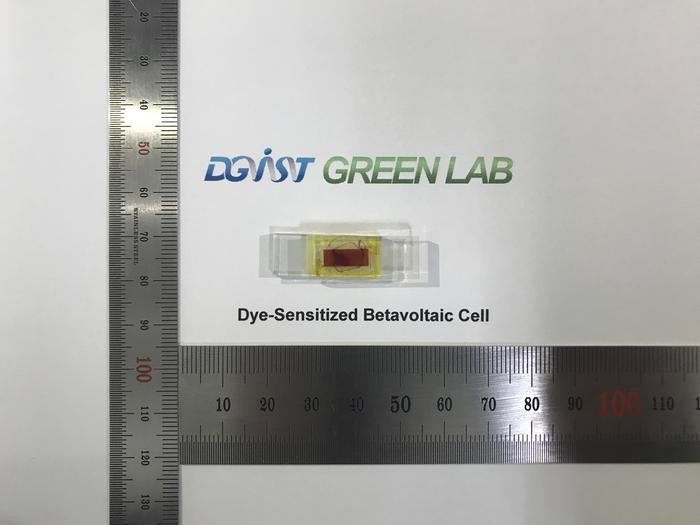 Betavoltaic cell powered by radiocarbon