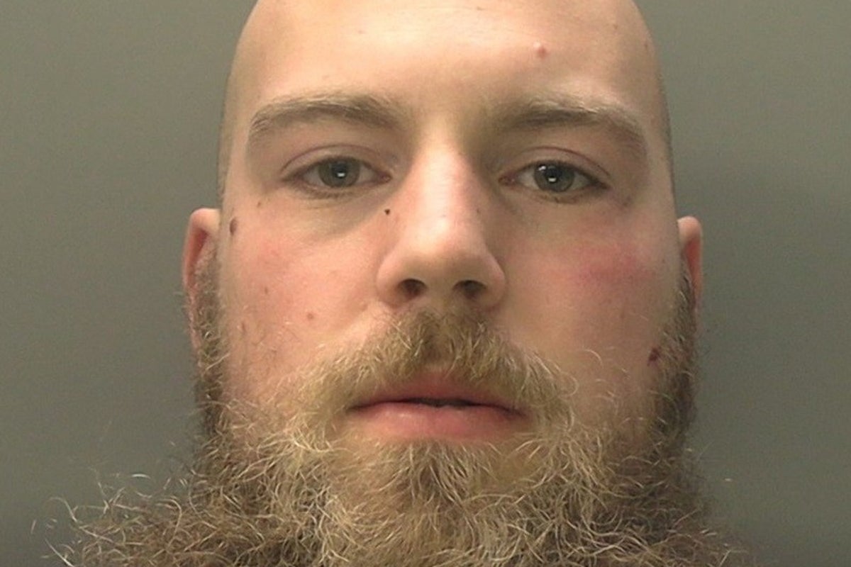 Armoured thug stabbed officer and knocked another unconscious in police station attack