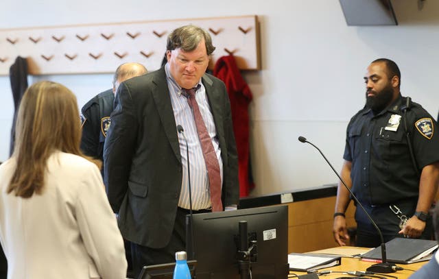 <p>Rex Heuermann, charged in a string of deaths known as the Gilgo Beach killings, appears in Judge Tim Mazzei's courtroom at Suffolk County Court in Riverhead, N.Y., on Friday, March 28, 2025</p>
