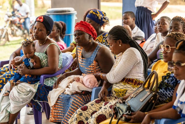 <p>Mothers sit in the recently build maternity clinic in the village of Podiagouime, Ivory Coast</p>