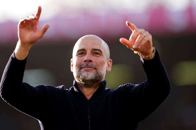 Manchester City manager Pep Guardiola celebrates after the FA Cup win at Bournemouth (Adam Davy/PA)