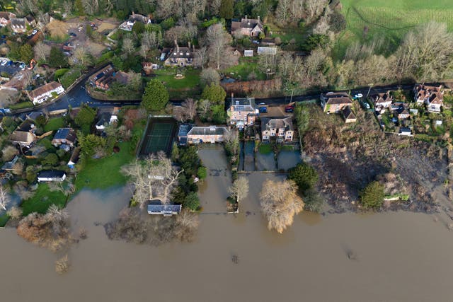 <p>A view of flooding around Pulborough in West Sussex in January this year (Andrew Matthews/PA)</p>