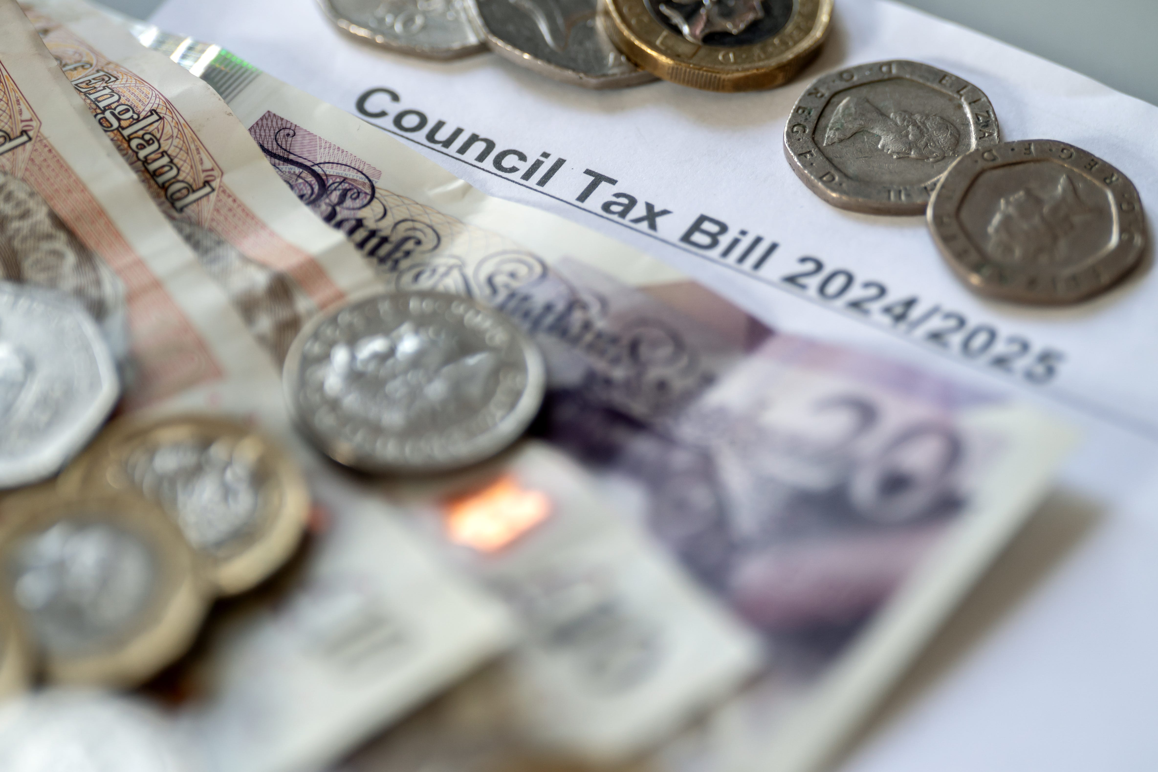 Most councils in England are planning to hike council tax bills by 4.99% (PA)