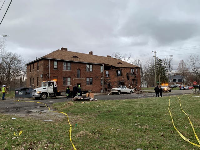 <p>Crews work on the scene after an apartment explosion on March 31 in Detroit</p>