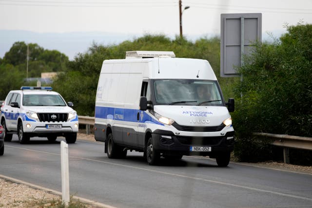 <p>A police van carrying the five Israelis who were accused of rape</p>