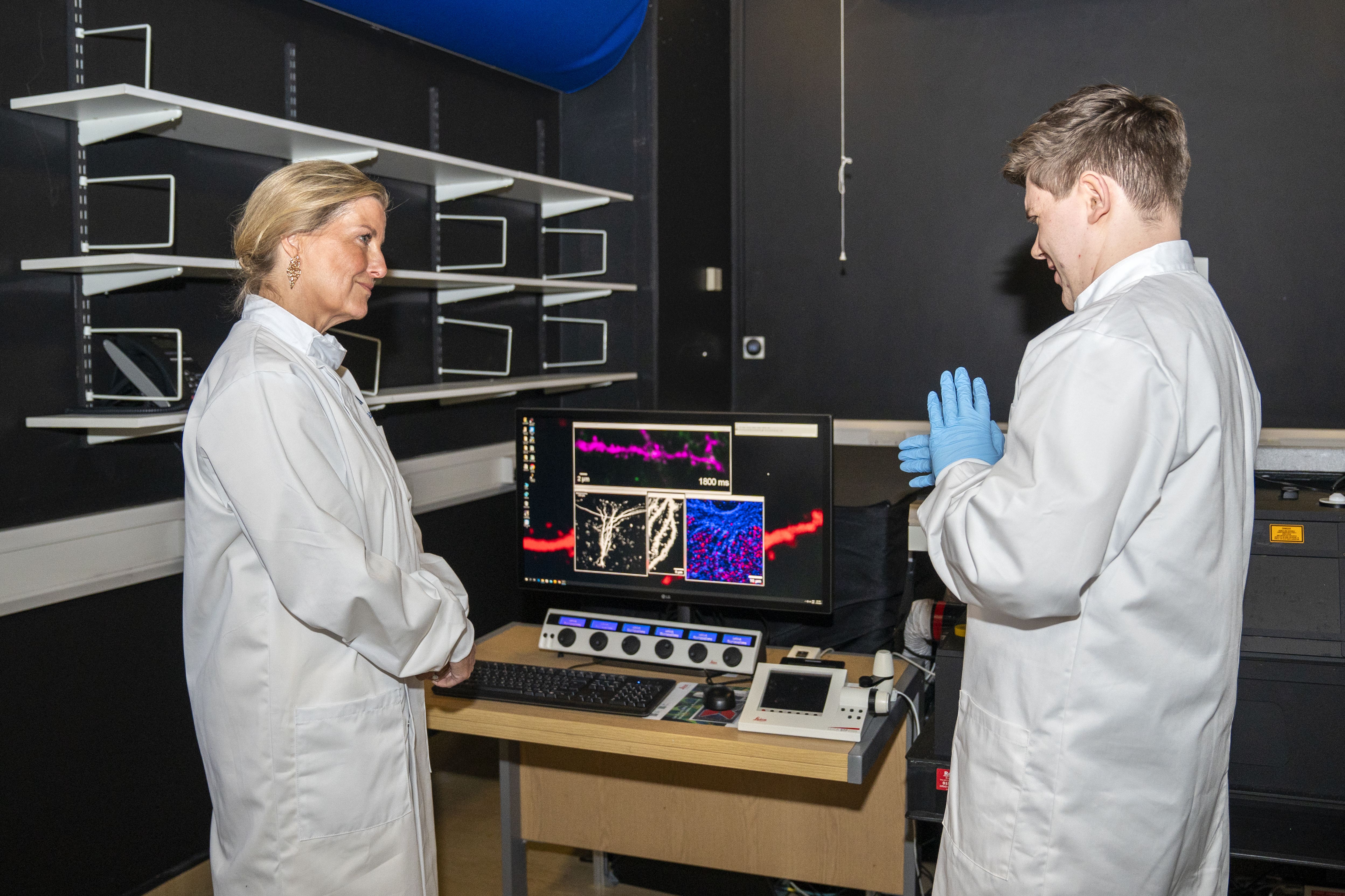 The Duchess of Edinburgh, patron of Race Against Dementia, with Dr Callum Bonthron during a visit to Edinburgh Neuroscience to hear about the work of Race Against Dementia (Jane Barlow/PA)