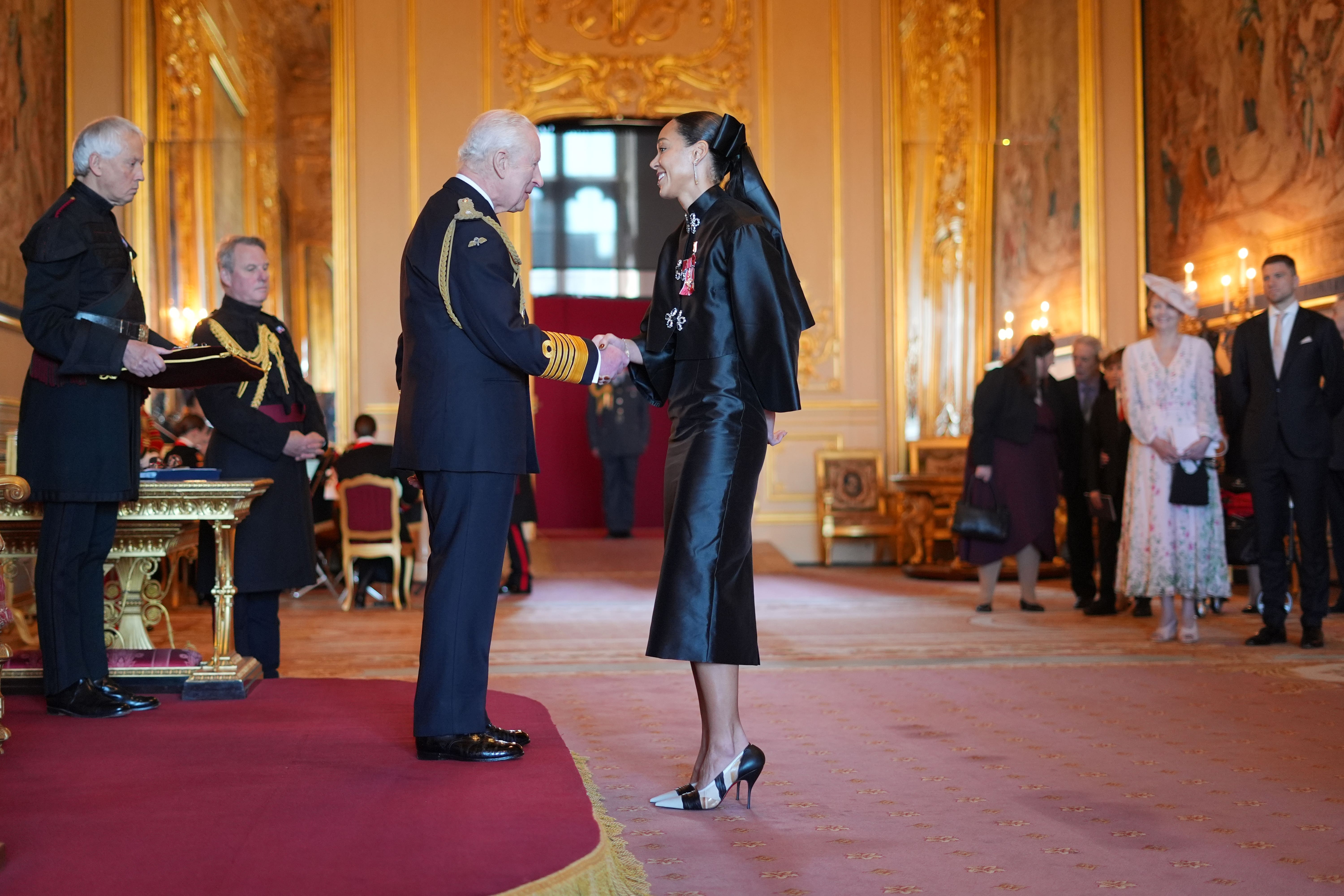 <p>Katarina Johnson-Thompson with the King</p>