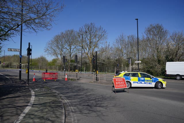 <p>A police cordon close to the scene of an accident on Belfont Road in Feltham</p>