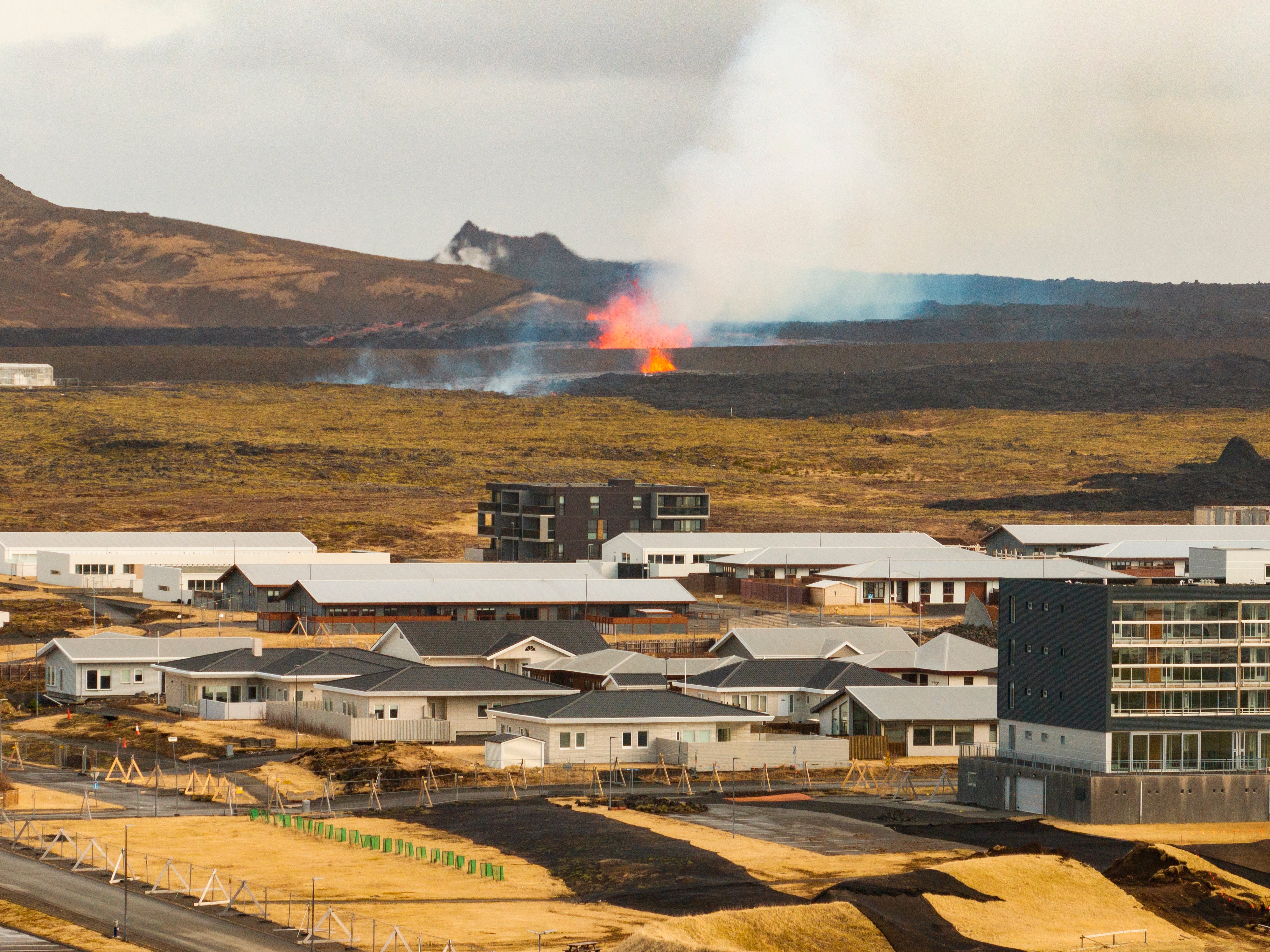 File image: The volcanic eruption is seen in the background near the town of Grindavik, on the Reykjanes Peninsula, Iceland, in April 2025