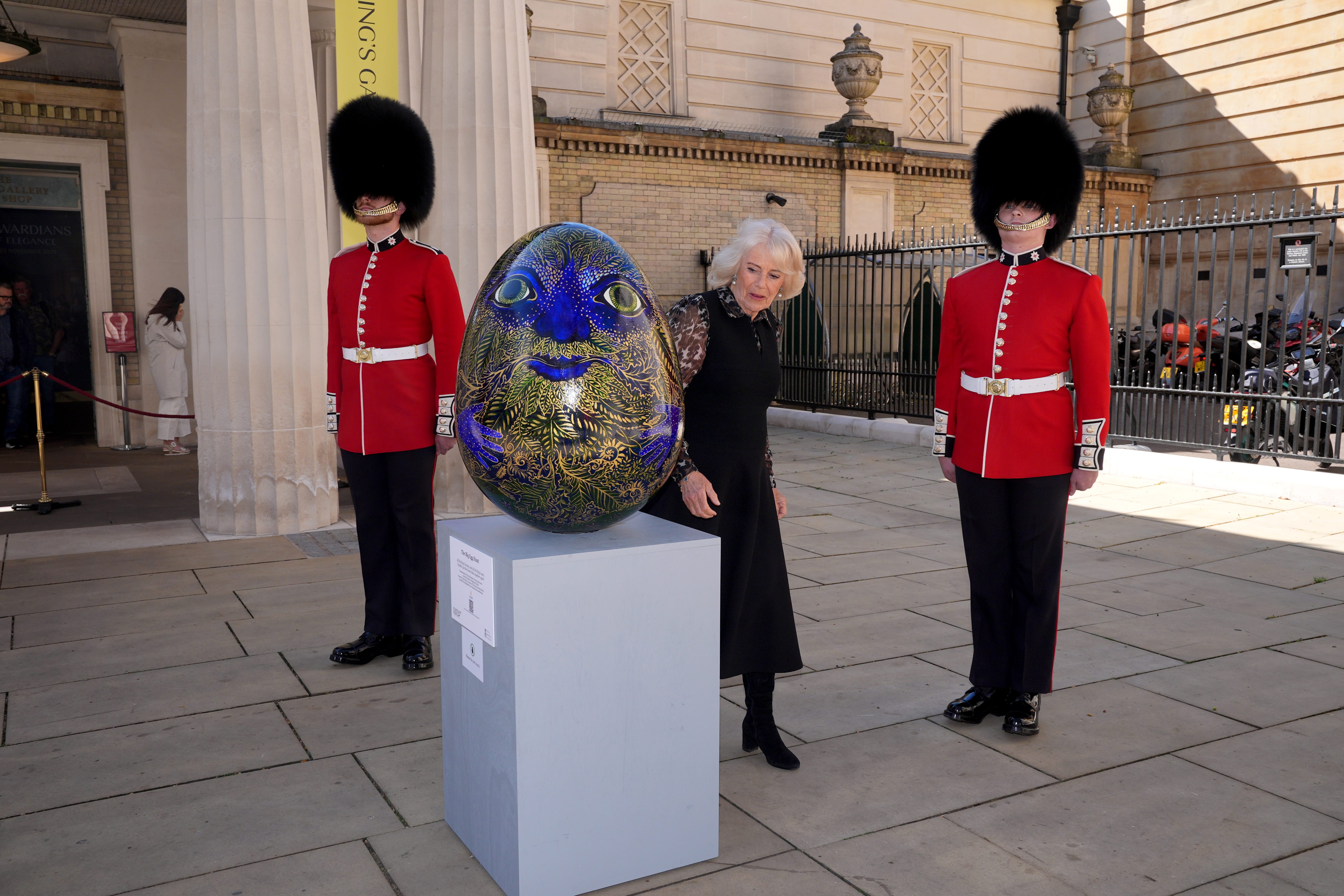 <p>Camilla inspects ‘Green Man Humpty Dumpty Egg’</p>