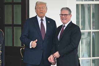 US president Donald Trump greets British prime minister Keir Starmer at the entrance of the West Wing of the White House in Washington, DC, on 27 February 2025
