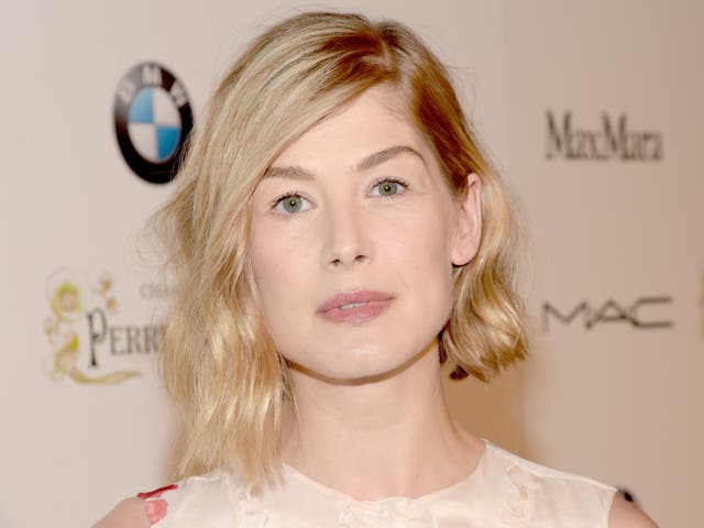 <p>Rosamund Pike was punched in the face when she had her phone snatched </p>