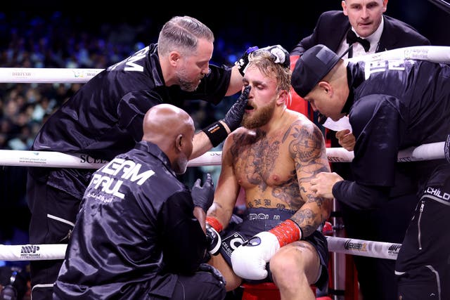 <p>Frank Greaves (top left) treating Jake Paul during the YouTuber’s fight with Tommy Fury</p>