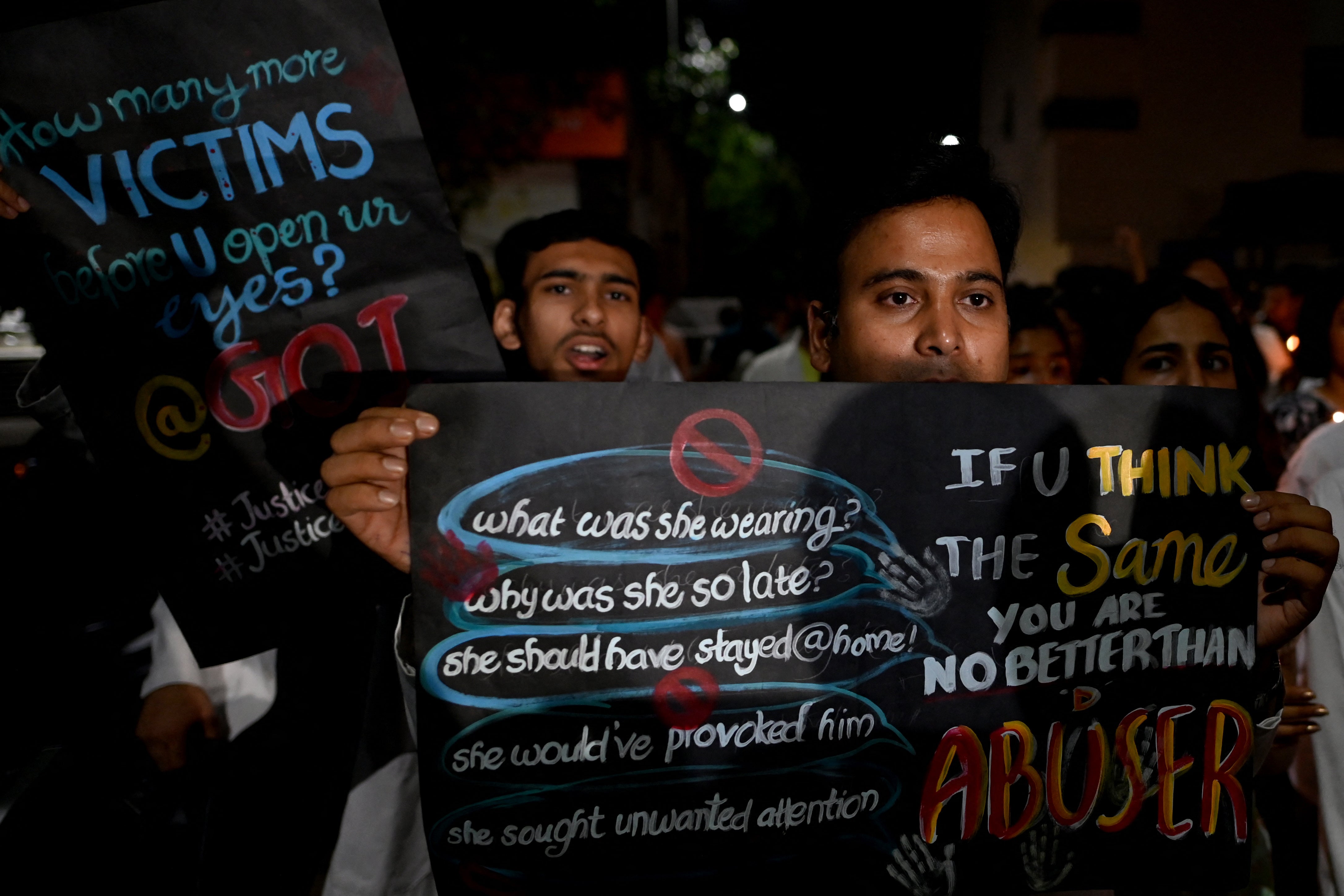 <p>File. Medical workers hold placards during a protest against the rape and murder of a junior doctor in eastern India, in Delhi on 4 September 2024</p>
