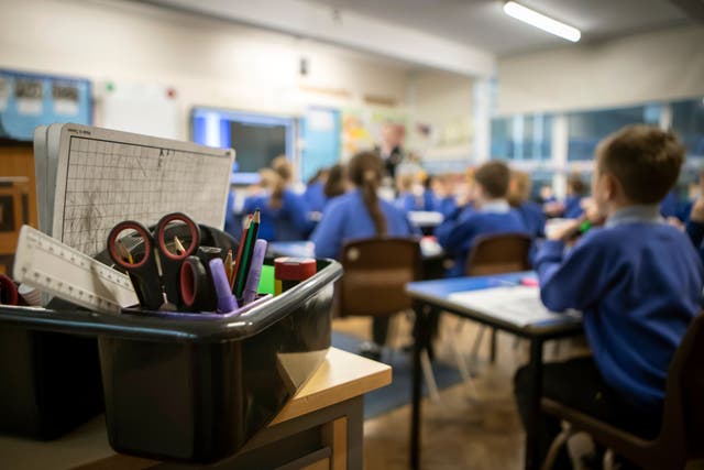 Boys need strong role models in school and at home, the Education Secretary has said (Danny Lawson/PA)