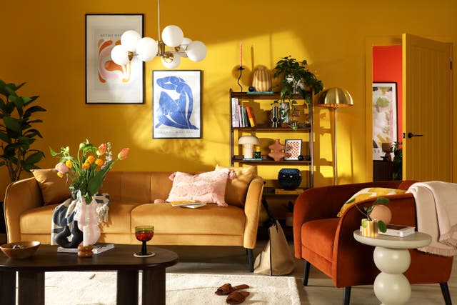 <p>Mustard Loren three-seat sofa at Furniture & Choice</p>