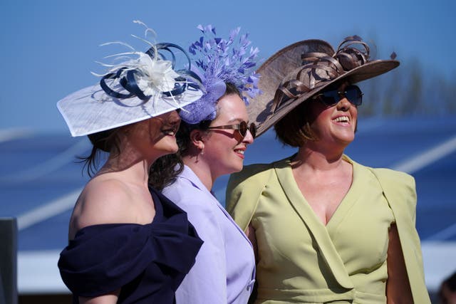 Crowds enjoyed the sunshine for the opening day at Aintree Racecourse (Peter Byrne/PA)