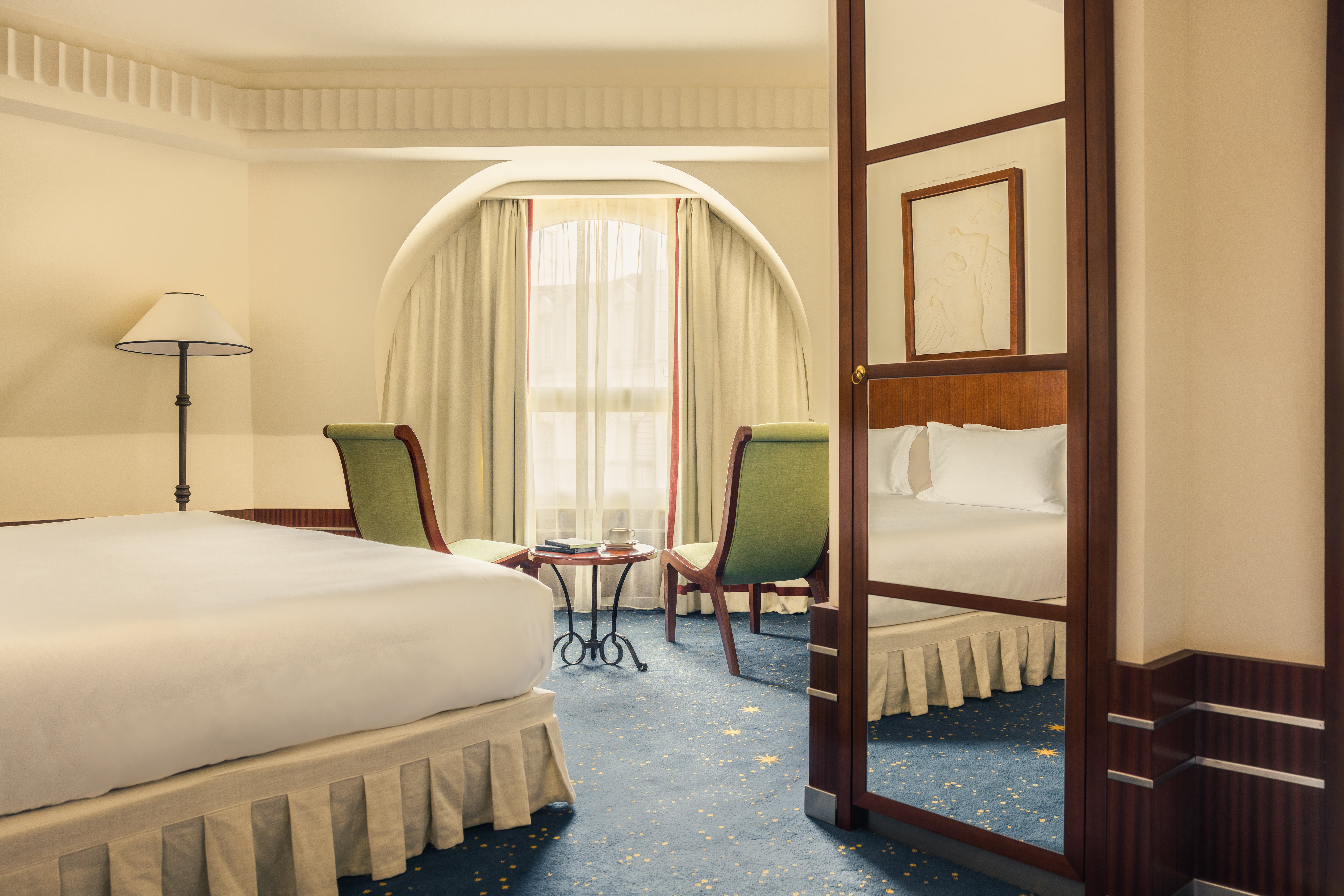 The rooms have an Art Deco aesthetic