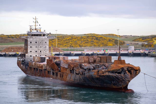 The Solong being towed in to the port of Aberdeen following the collision (Michael Wachucik/PA)