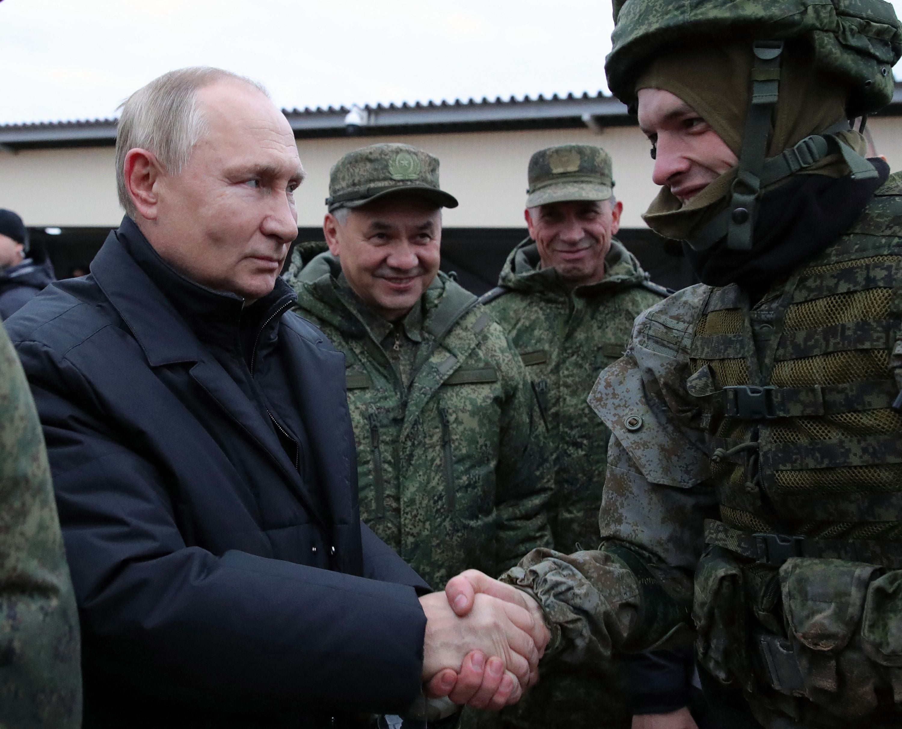 Vladimir Putin meets soldiers during a visit to a military training centre outside the town of Ryazan on 20 October 2022. Russia now has to offer huge financial incentives to get people to join up