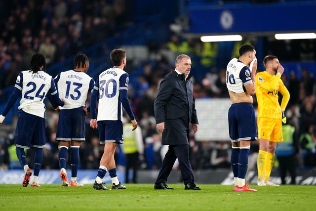 Tottenham Hotspur manager Ange Postecoglou and the players appear dejected after the Premier League match at Stamford Bridge, London. Picture date: Thursday April 3, 2025.