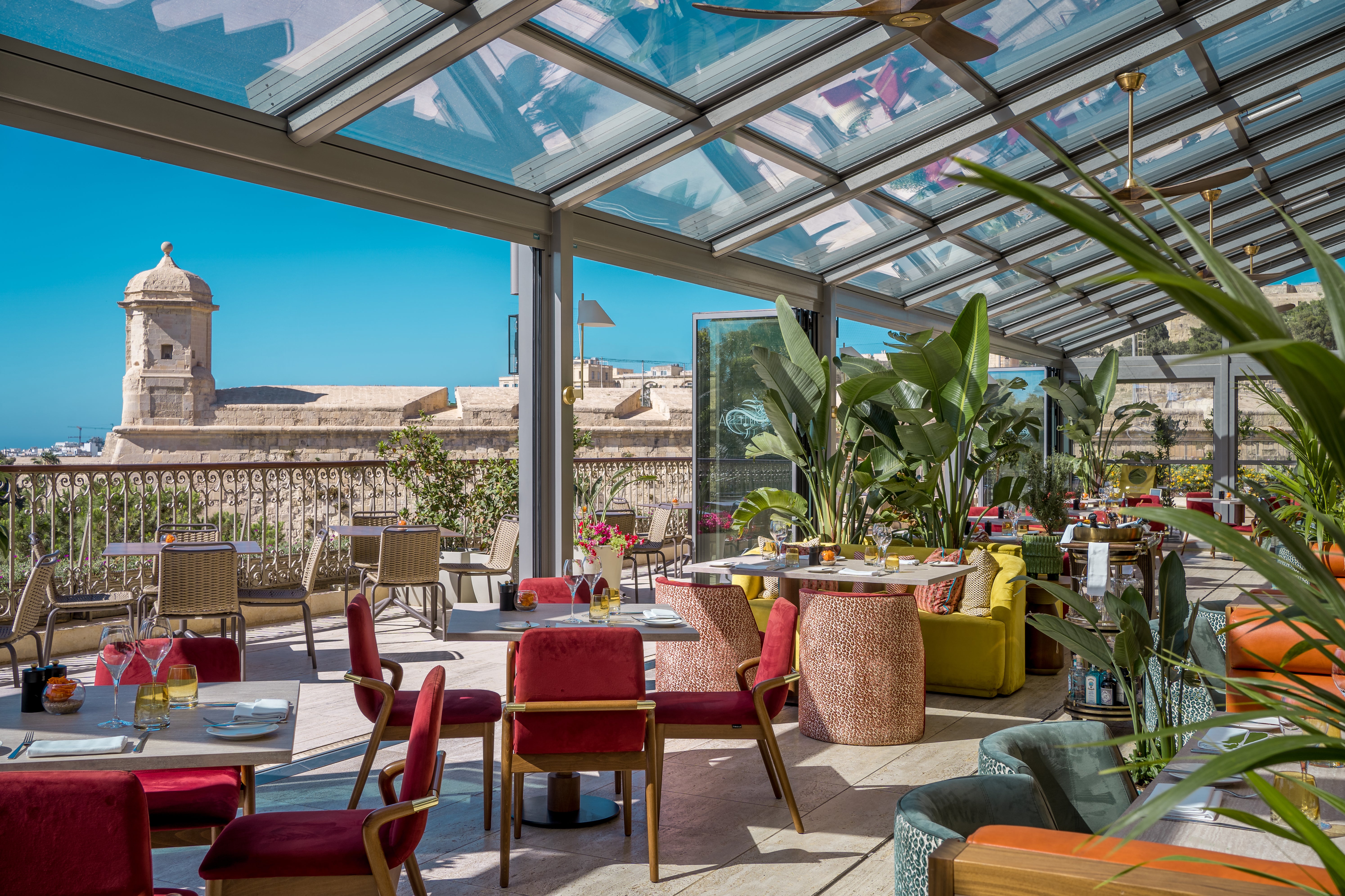 Sip a glass of wine on the Phoenicia’s Contessa Conservatory terrace