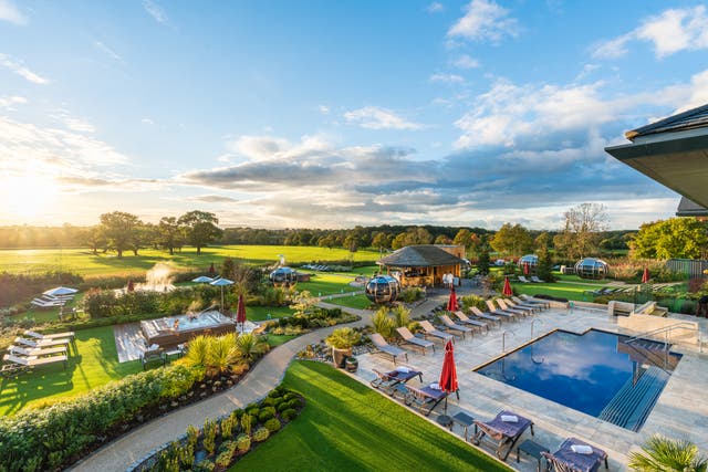 <p>Carden Park’s outdoor spa, one of the largest garden spas in the UK, area has relaxation pods, a pool and hot tubs</p>