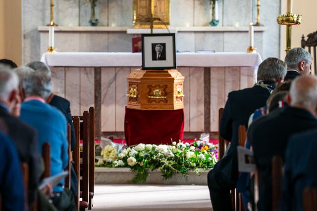 Mick O’Dwyer’s coffin at his funeral at St Finian’s Church in Waterville (Noel Sweeney/PA)