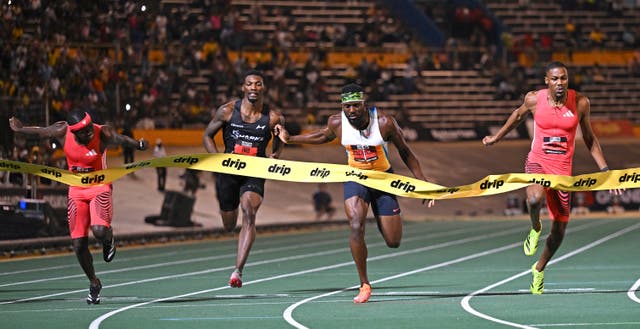 <p>Kenny Bednarek competes in the men’s 100m in the Grand Slam Track meet in Kingston, Jamaica</p>