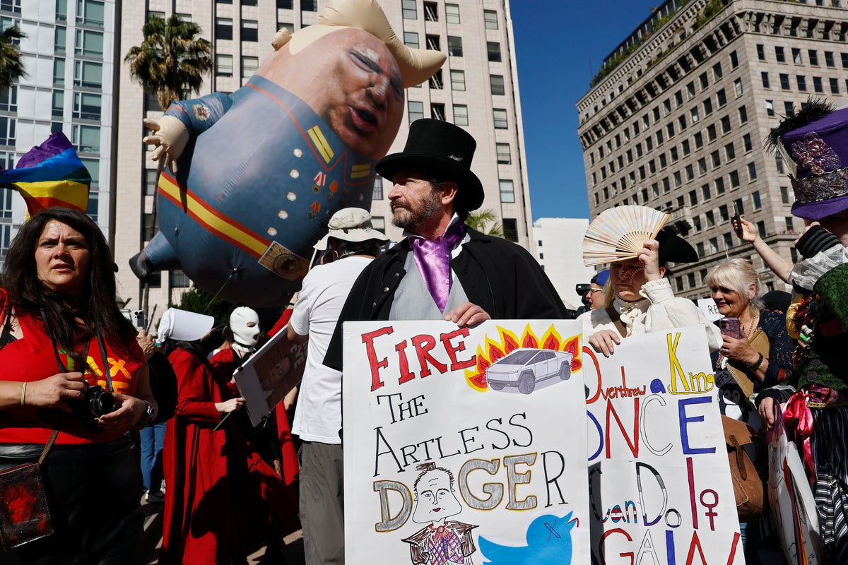 Best signs from the nationwide Hands Off protests denouncing the Trump administration
