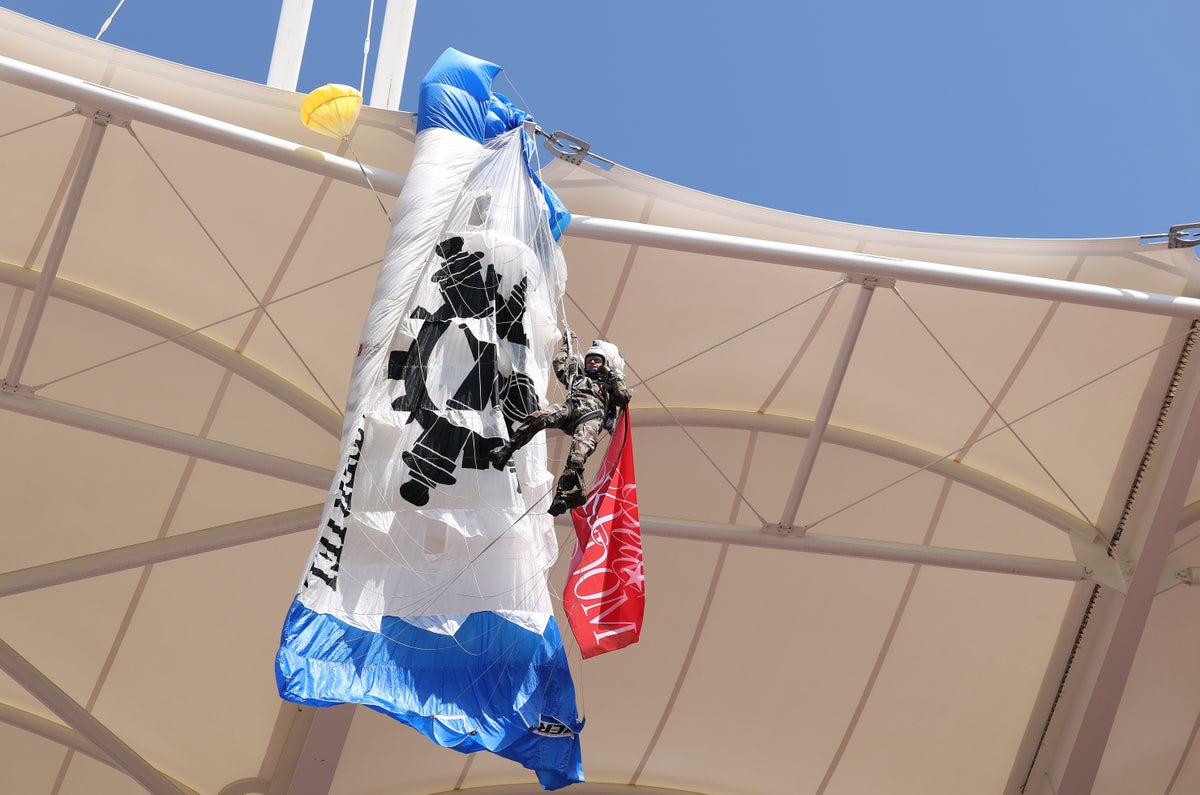 Parachutist left dangling from rugby stadium roof after crash | Sport