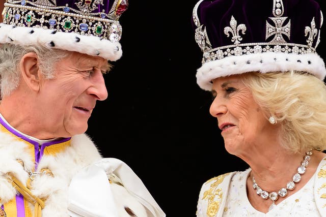 <p>King Charles III and Queen Camilla seen on the balcony of Buckingham Palace during his coronation in 2023</p>