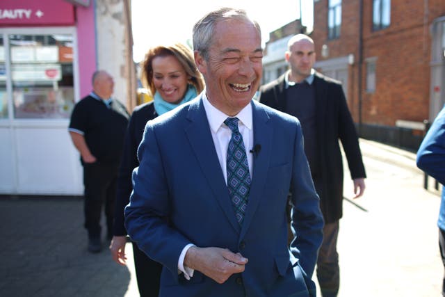 <p>Nigel Farage campaigning in the Runcorn by-election</p>