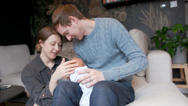 <p>Grace and Angus Davidson with their daughter, Amy Isobel</p>