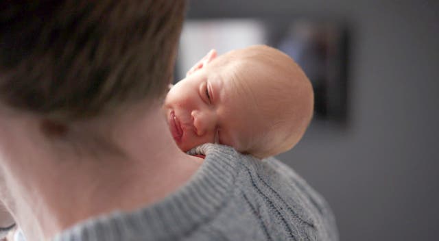 <p>Angus Davidson with baby Amy Isabel</p>