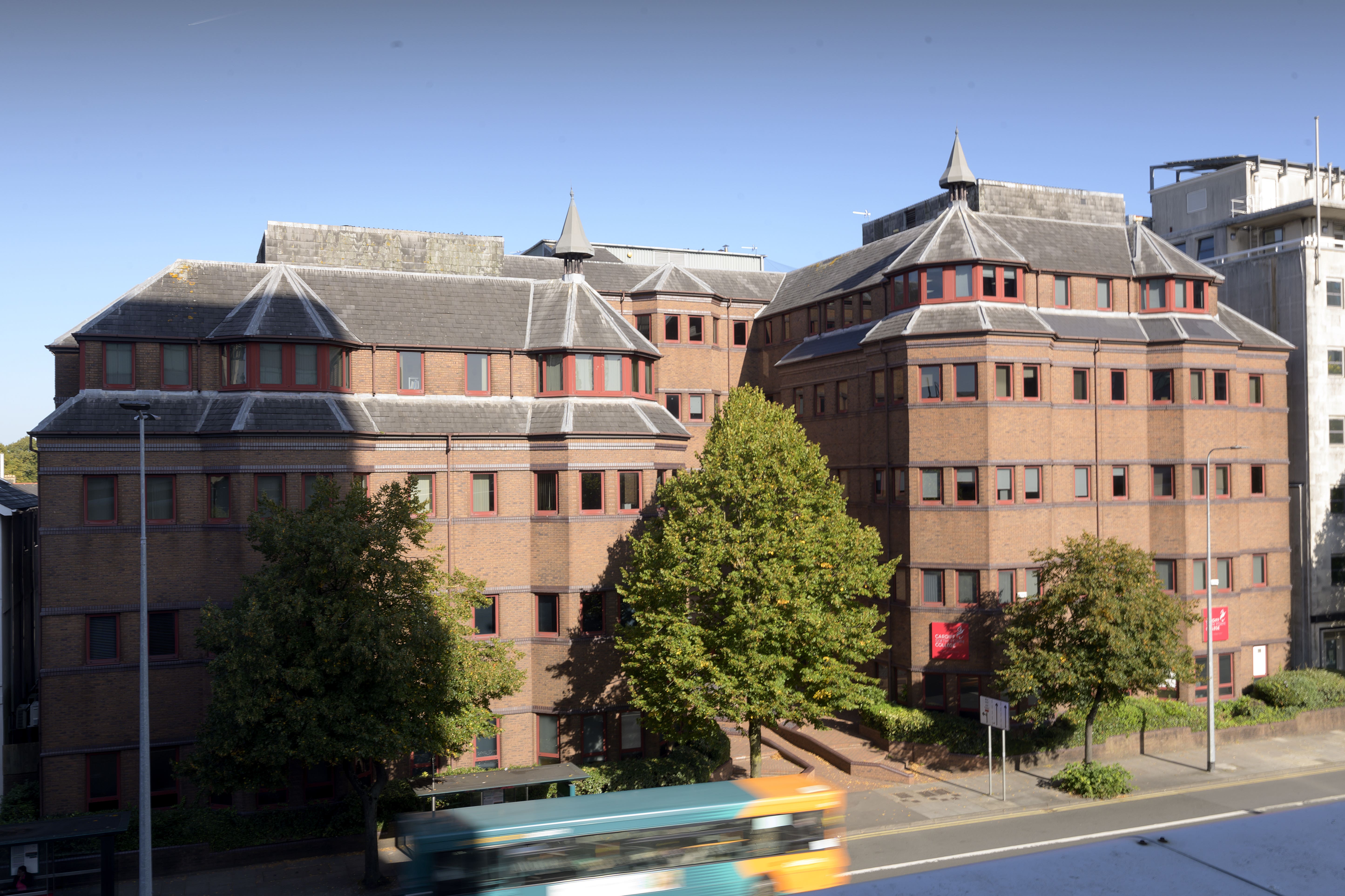 Three people have denied a series of charges relating to fraud at Cardiff Sixth Form College