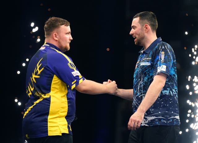 <p>Luke Littler (left) celebrates a win over Luke Humphries in March</p>