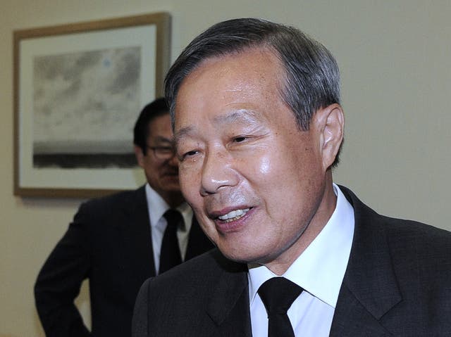 <p>Kim Shin Jo at a funeral  in 2010 </p>