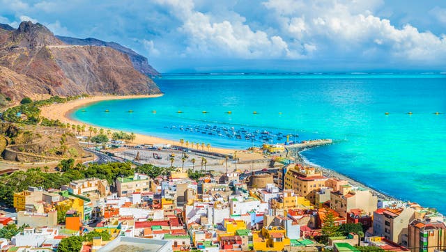 <p>Tenerife’s coastlines mix golden sands with black volcanic beaches</p>