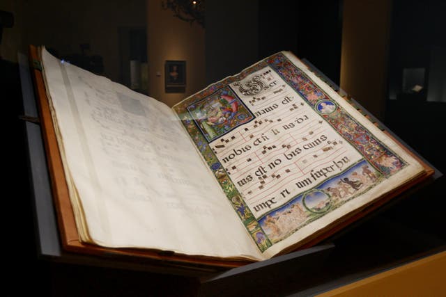 <p>A medieval book is displayed during the Arcimboldo exhibition in Milan</p>