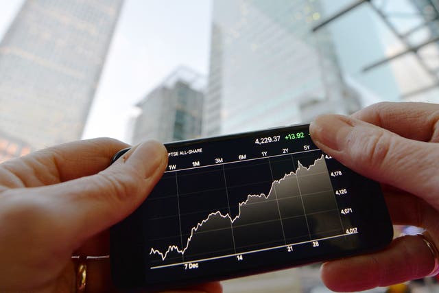 Shares were lower in London on Wednesday (John Stillwell/PA)