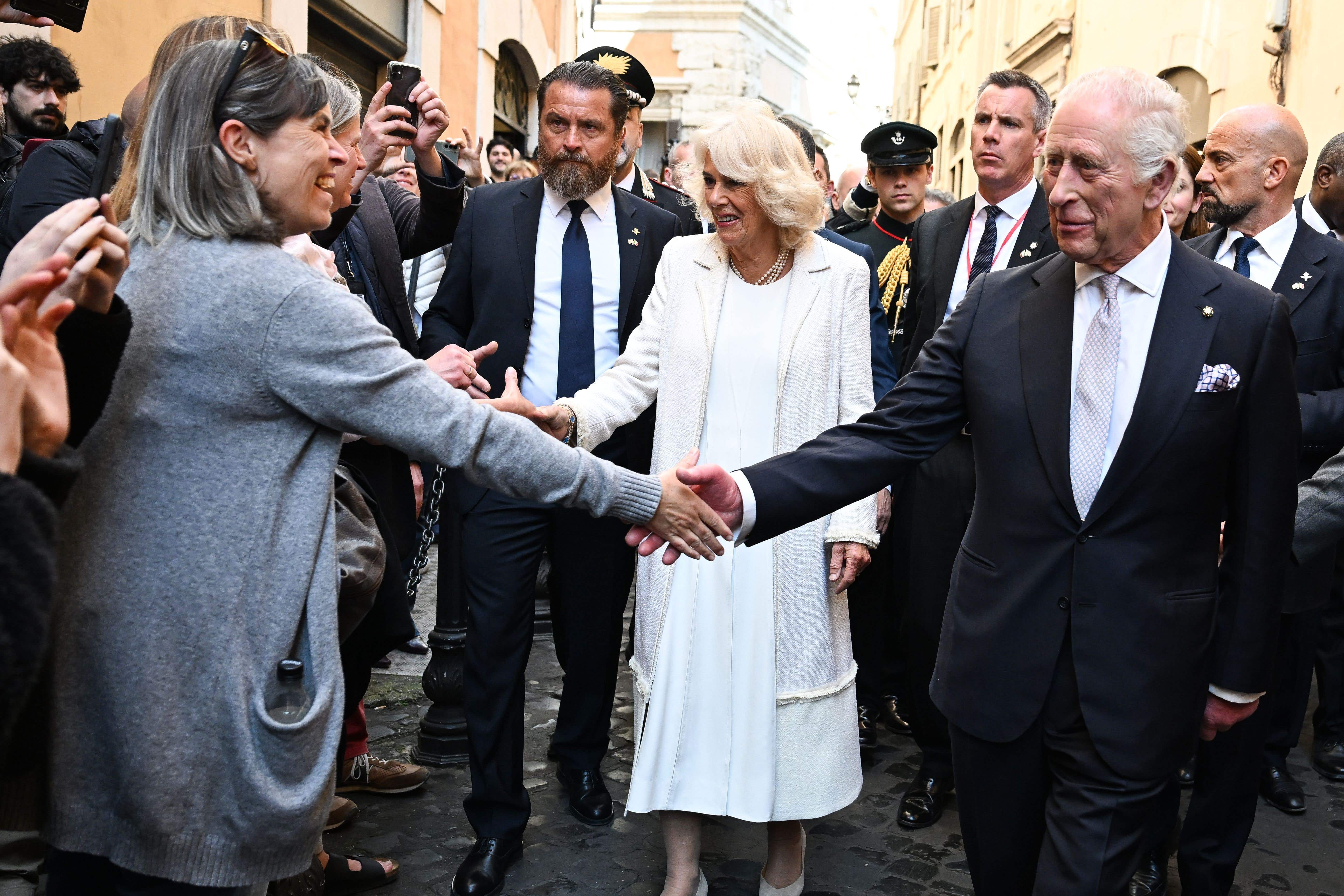 The King and Queen Camilla meeting members of the public while on a walkabout in Rome (Victoria Jones/PA)