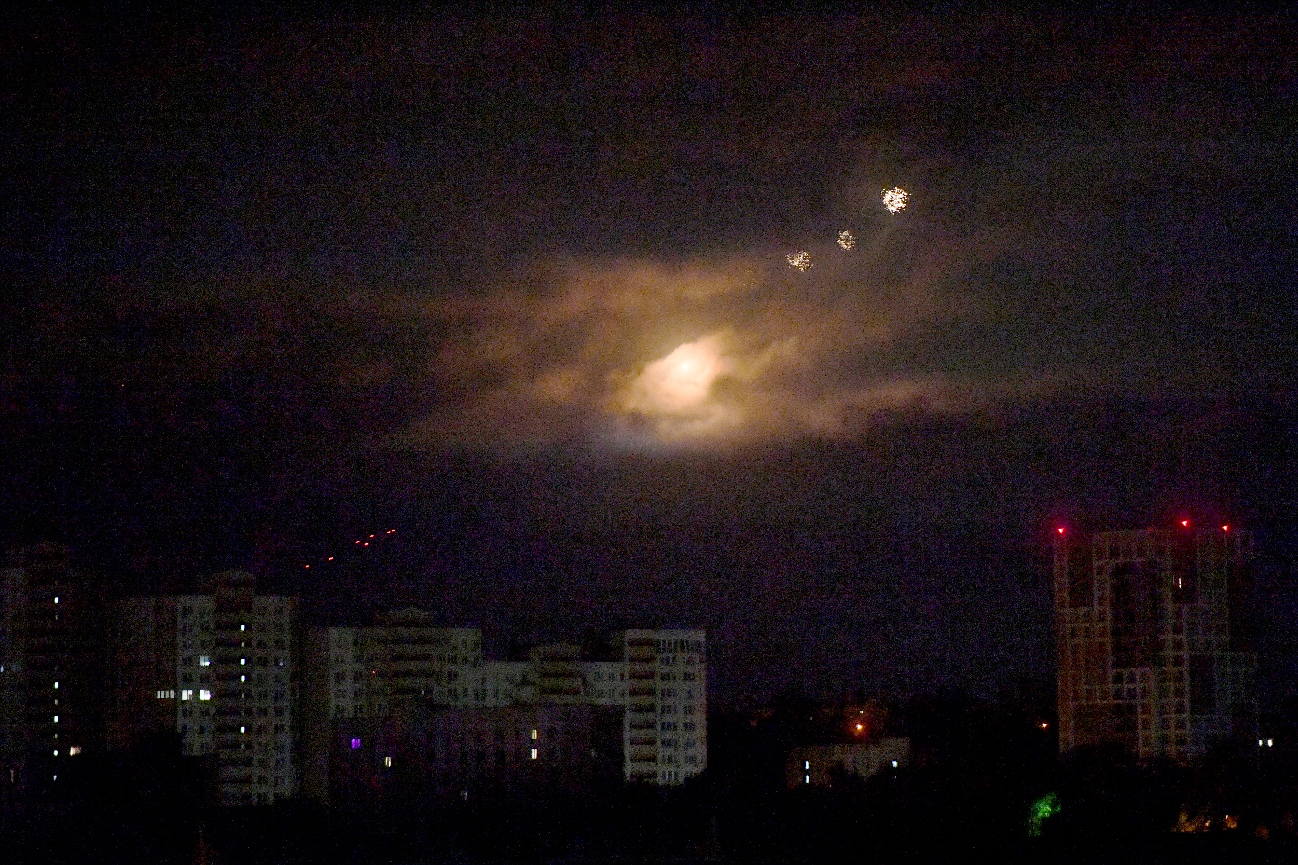 Drones explode as they are being destroyed by Ukrainian air defence during mass night strike to Ukrainian capital of Kyiv