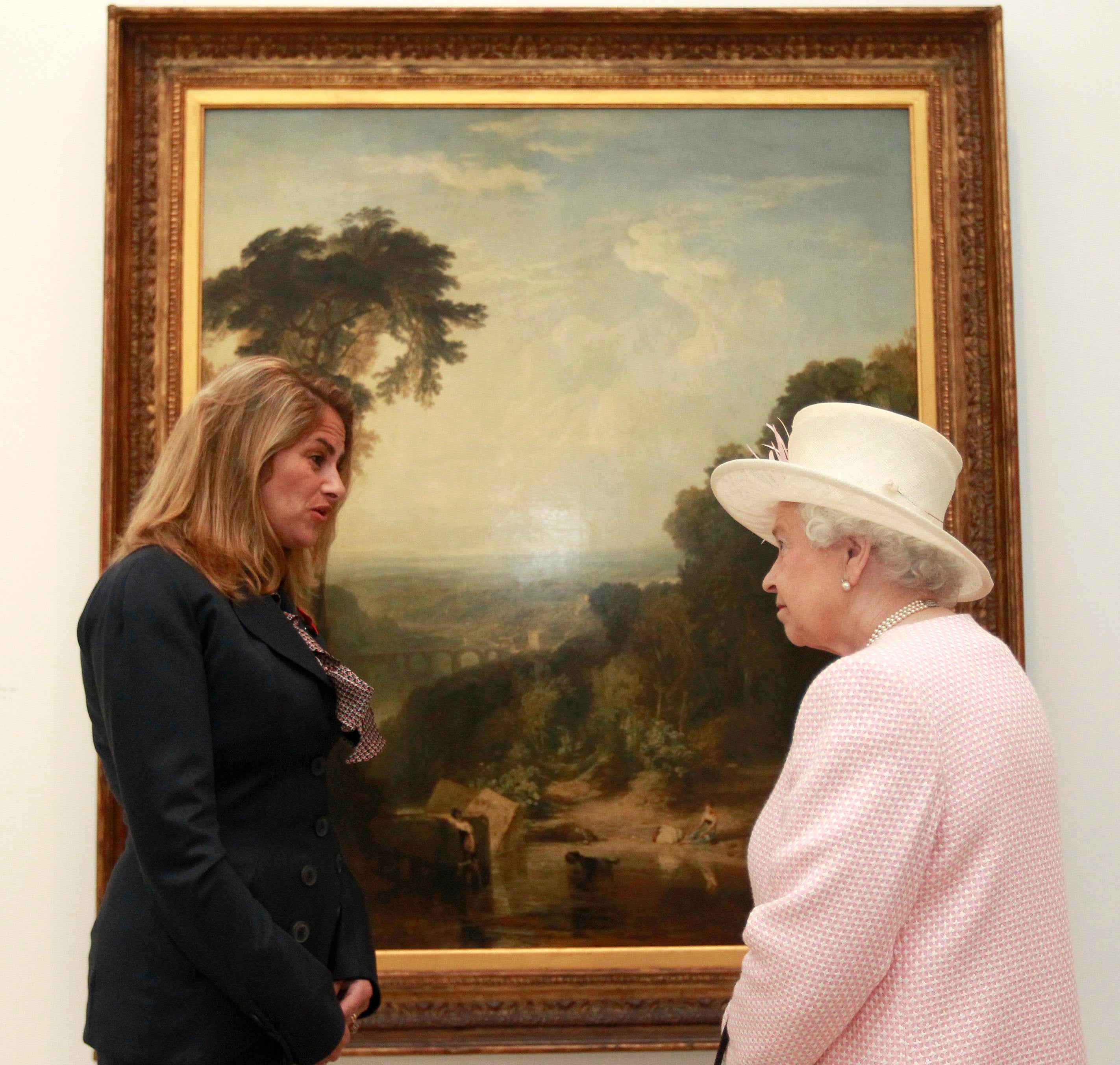 Queen Elizabeth II meets Tracey Emin in front of JMW Turner’s ‘Crossing the Brook’ while visiting the Turner Contemporary Gallery in 2011