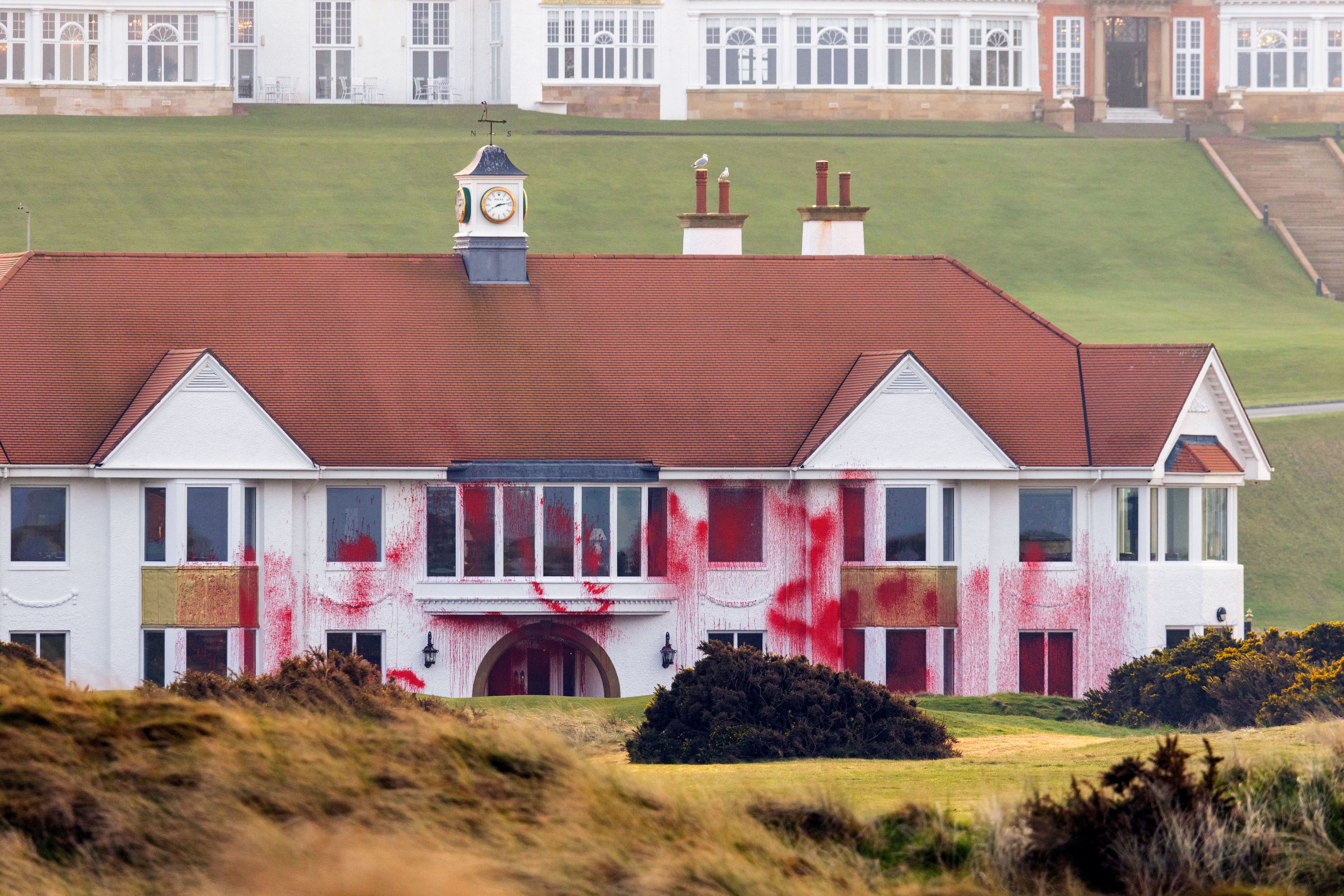 A sixth person has been arrested in connection with damage at a golf course owned by Donald Trump on March 8 (Milo Chandler/PA)