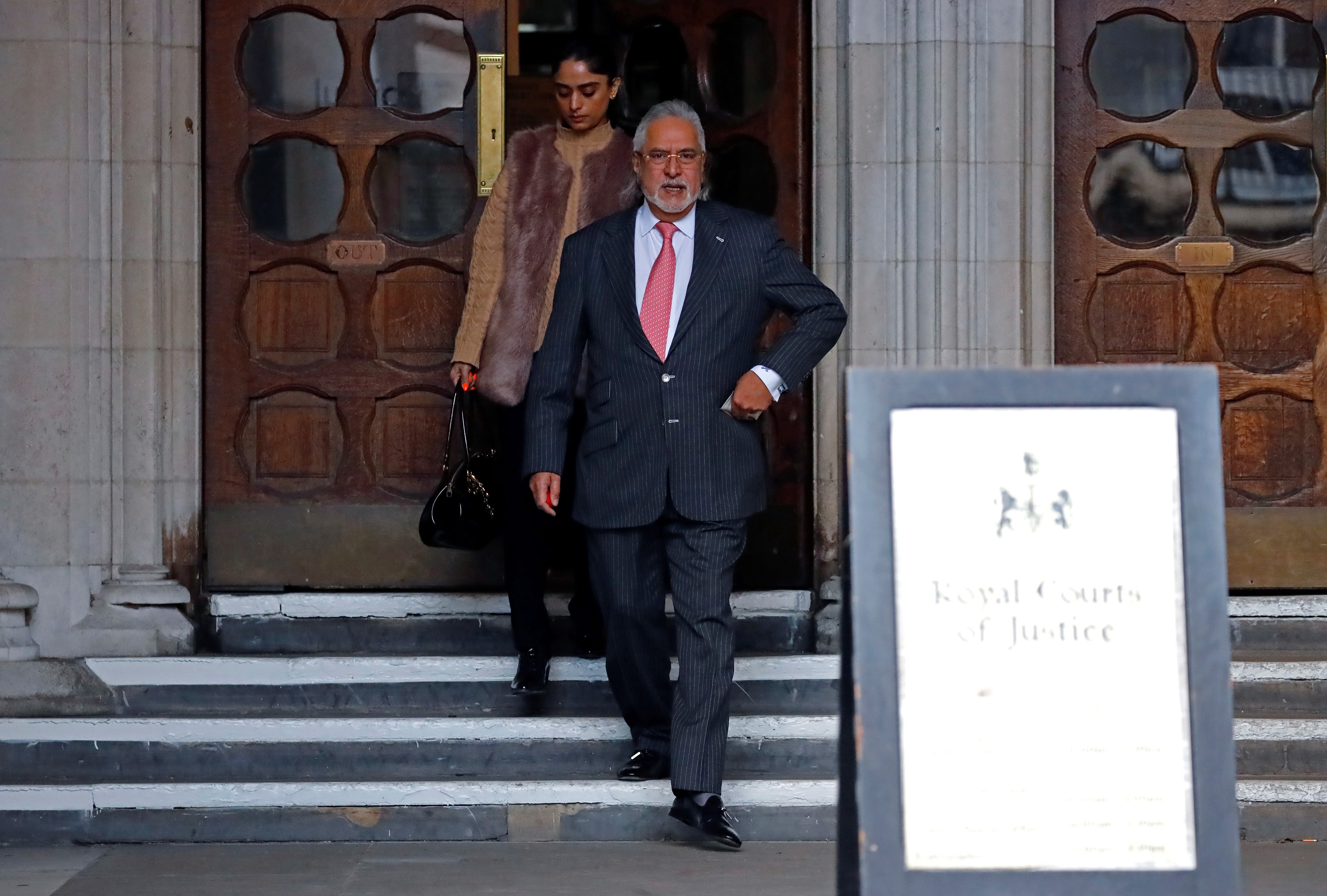 <p>File. Indian tycoon Vijay Mallya leaves the Royal Courts of Justice in London on 11 February 2020</p>