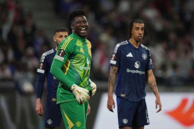 Manchester United’s goalkeeper Andre Onana, (centre) again found his performance under the microscope (Thibault Camus/AP)
