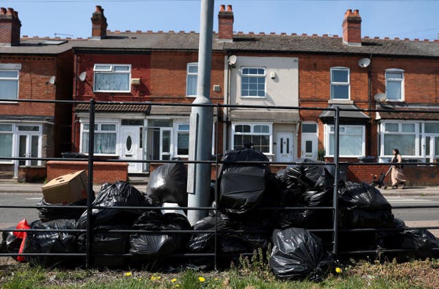 <p>Rubbish bags are piled up on the street, as the strike action by Birmingham bin workers represented by the Unite union enters its fifth week in Birmingham, Britain, April 11, 2025.</p>
